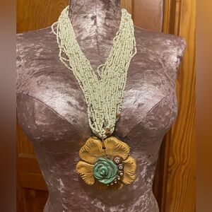 Unique seed bead & giant carved flower necklace